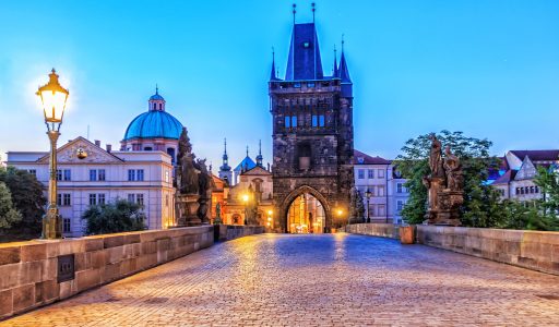 Charles bridge and Old Town of Prague in morning twilight.